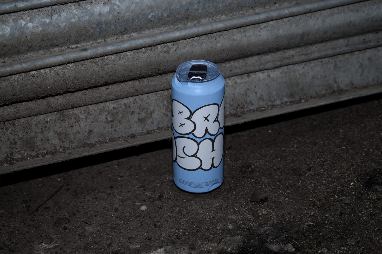 Blue spray paint can with graphic design, urban setting, ideal for mockup, graffiti, street art, product design, texture background.